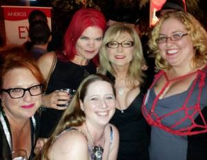 5 women posing at a party: JoEllen, Elle Chase, Nina Hartley, Ashley Manta, Kali Morgan
