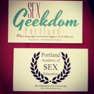 Two business cards. One reads "Sex Geekdom Portland" and the other reads "Portland Academy of Sex Education"