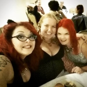 Three women: 2 redheads and one blonde