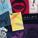 A copy of Vibrator Nation surrounded by sex shop t-shirts